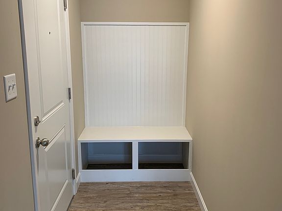 Beautiful; custom built in entry seating.