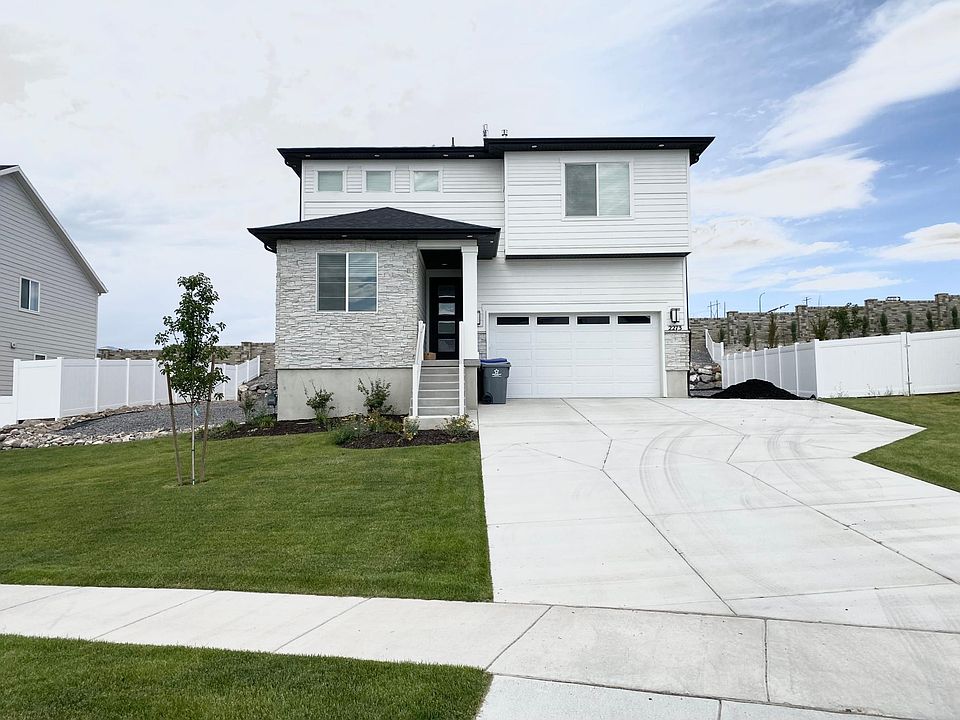 Front of the house with long driveway