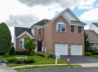 26 Baltusrol Dr, Manalapan, NJ 07726
