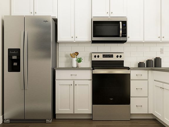 Enjoy a full suite of appliances by Whirlpool in this move-in ready home