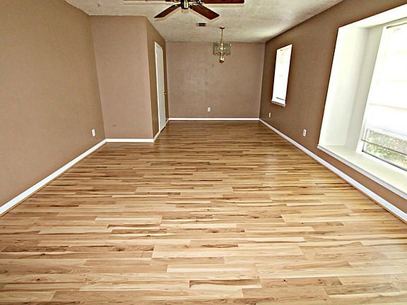 ENTERTAIN IN UNCROWDED COMFORT IN FORMAL LIVING ROOM.