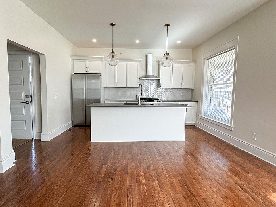 Kitchen w/ stainless steel appliances.