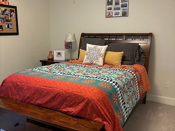 2nd Bedroom has new Queen Bed, Dresser, Walk-In closet and full bathroom outside of room. There is a 2nd family room on this level with couch, large TV and Exercise Equipment