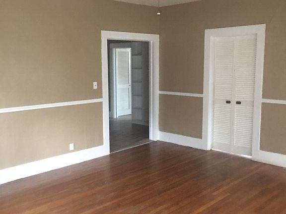 Spacious Living Room with view going into Dining Room
