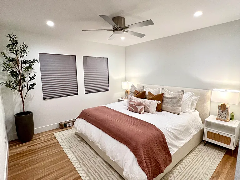 Primary Bedroom: Private primary suite with King Tempur-Pedic ProBreeze Hybrid mattress, adjustable bed base with built-in bluetooth speaker