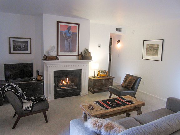 Living Room With Twin Day Bed and Double Swing-Open Patio Doors