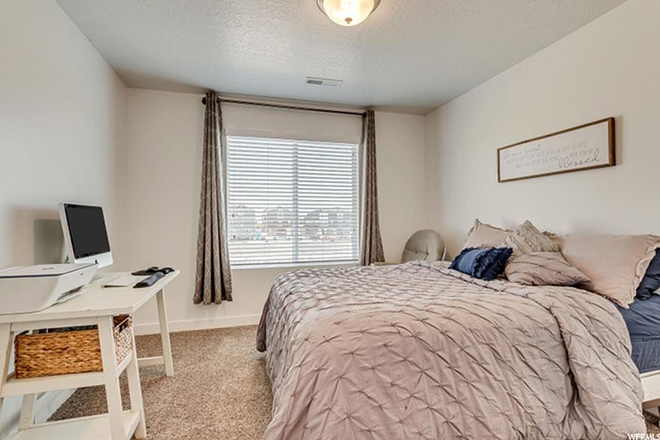 Bedroom comes unfurnished, but this gives you a feel. Curtains provided.
