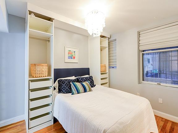 Bedroom features built-ins and a full closet