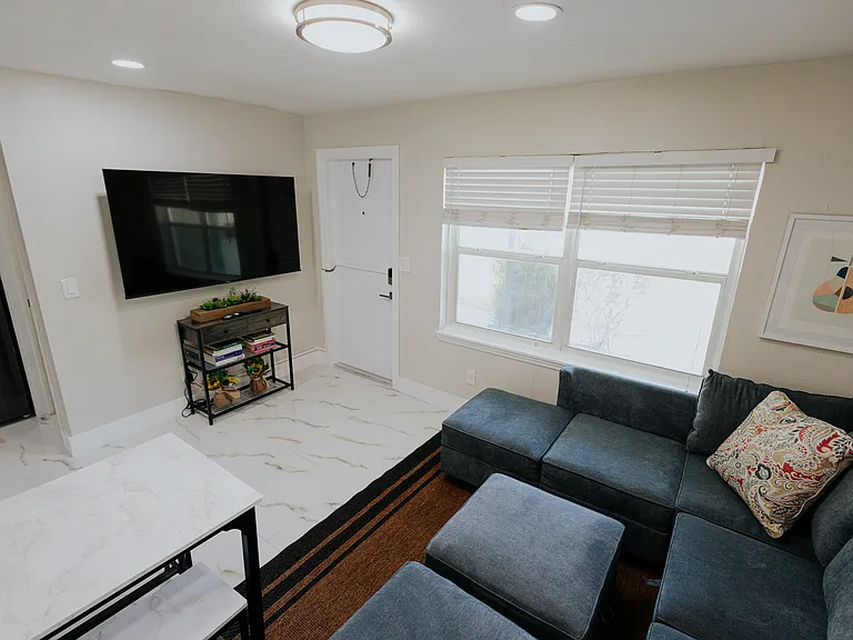 Living Room with sleeper sofa and TV.