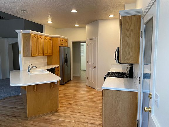 Kitchen with new hard wood and countertops