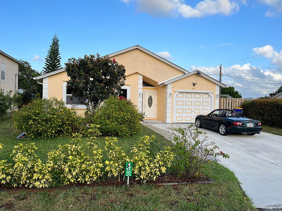 FRONT OF HOUSE AND YARD