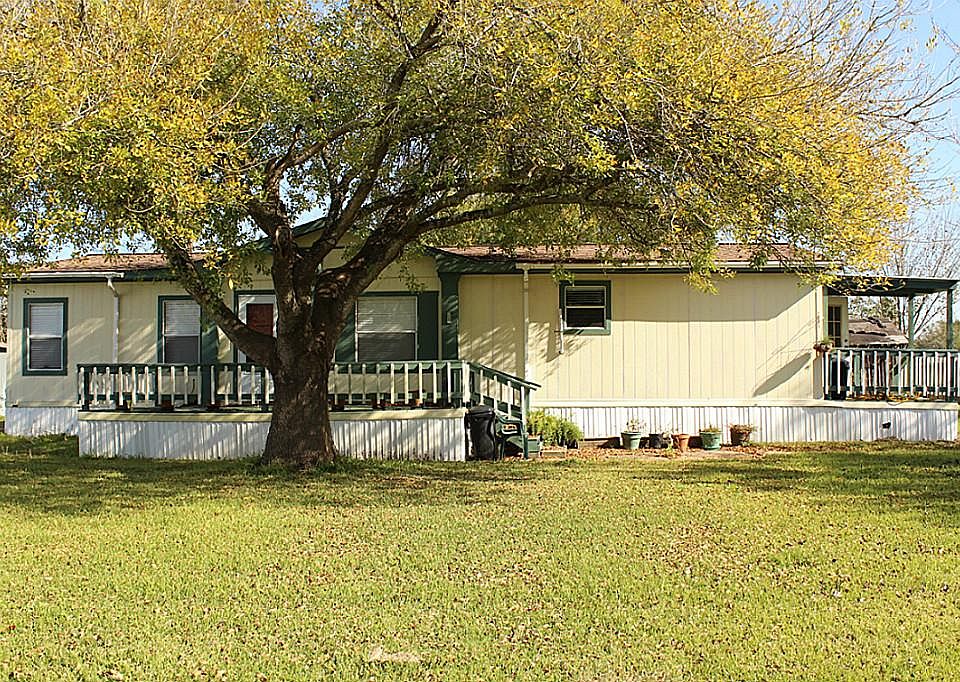Beautiful Tree In Front Yard Provides Great Shade.