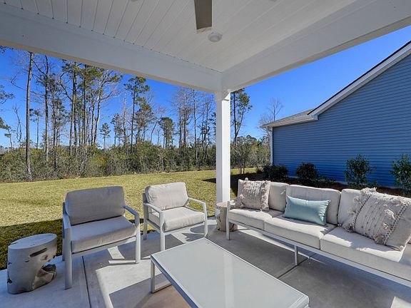 Bask in serene tranquility beneath the sheltered haven of the lanai.