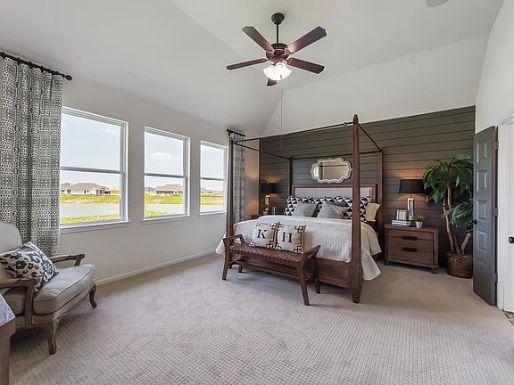 Owner s suite with sloped ceiling