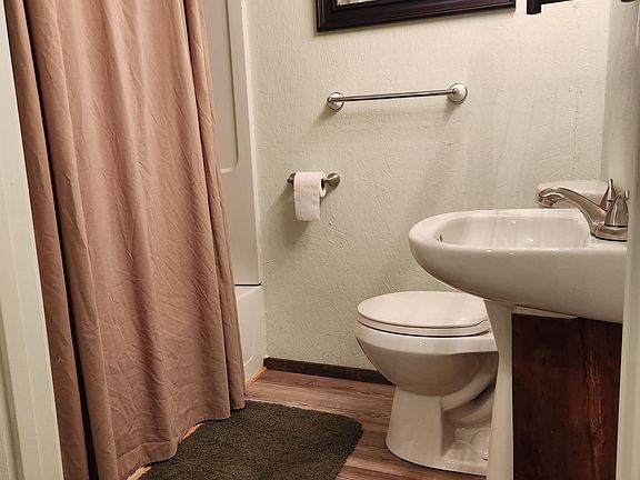 Bathroom with tub and shower