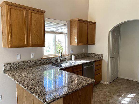 Kitchen sink and dishwasher.