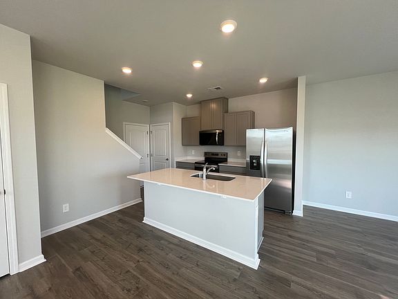 Kitchen Island and dining to the right.