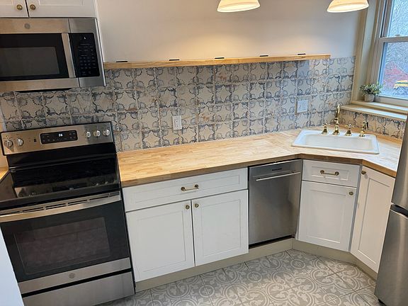Kitchen with corner sink