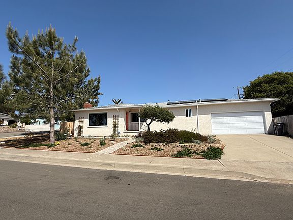 Plenty of parking and storage with two car garage.