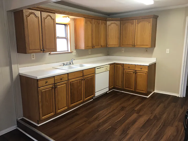 Large kitchen with new flooring