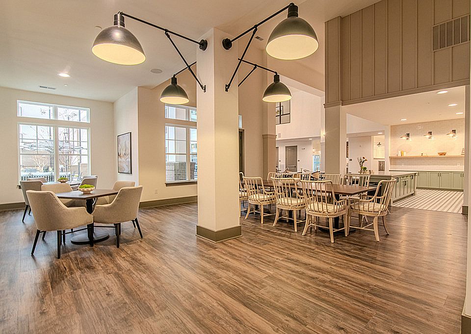 Experience open-concept living with this elegant dining area, perfect for gatherings.