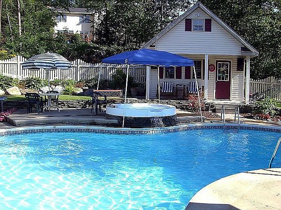 Mountain Lake shaped pool, spa and pool house