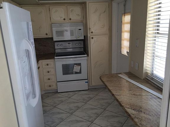 2nd image of 3250 N Palm Aire Dr APT 307