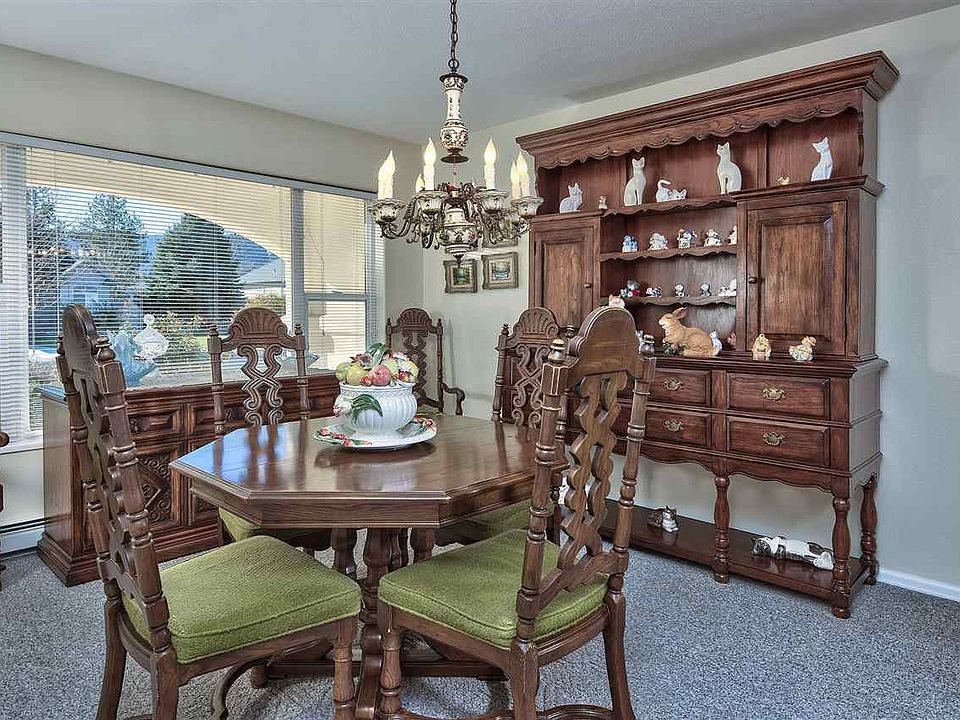 The classic formal dining room is off the kitchen and living room and is ready f