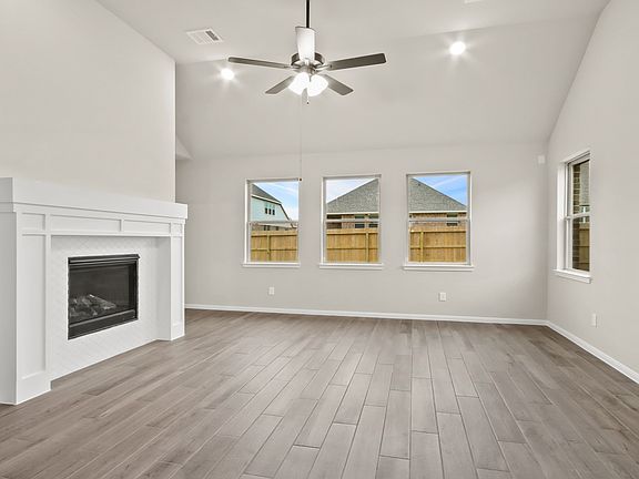 Spectacular great room with cozy fireplace
