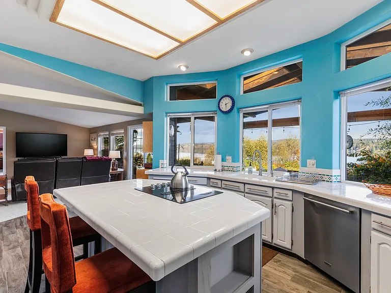 Spacious kitchen with bay view windows