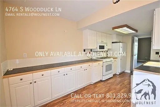 4764 S Woodduck Ln — Photo 4