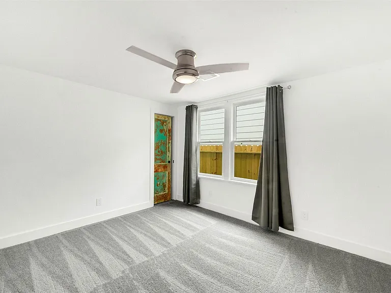 129 E 31st 1/2 St — Photo 13