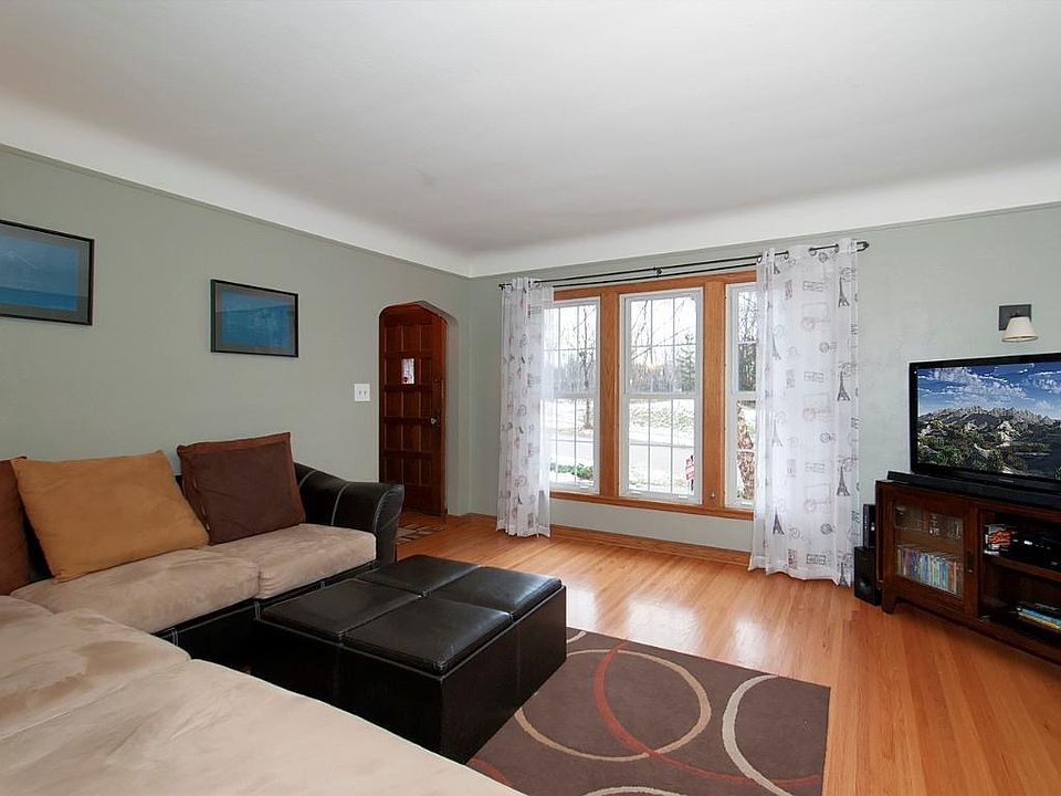 Spacious living room with large windows