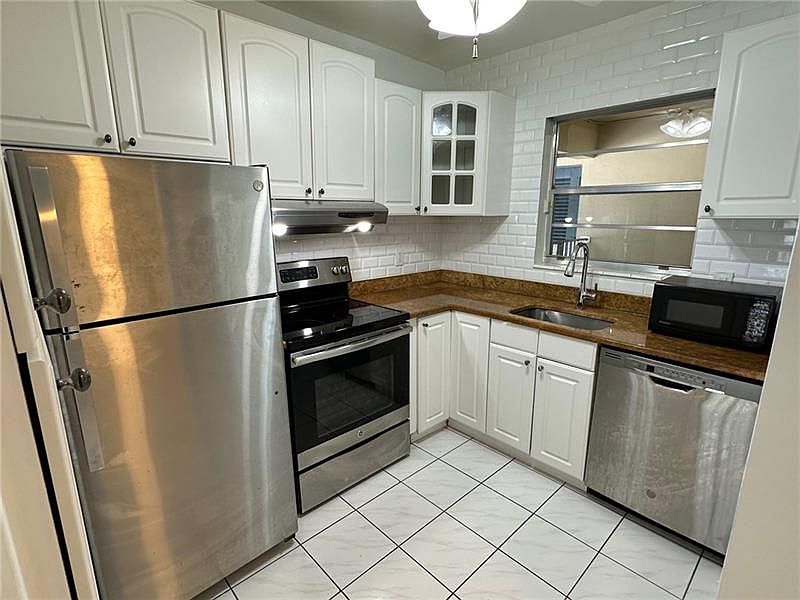 1st image of 1400 NE 57th Ct APT 104