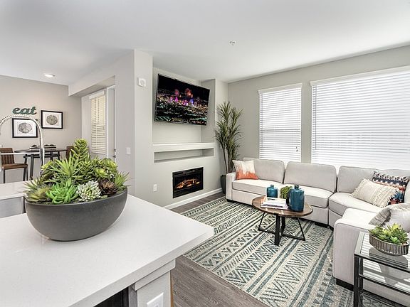 Lumina at Spanish Springs Luxury Apartments Model Living Room and Kitchen Counter