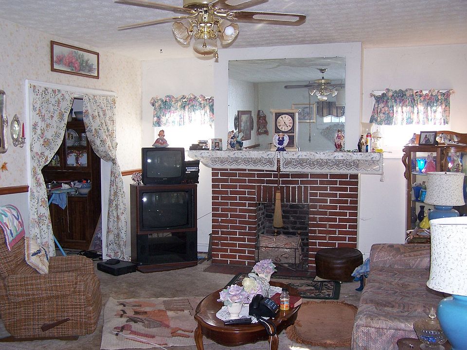 Living Room(HDWD floors under all carpet throughout home