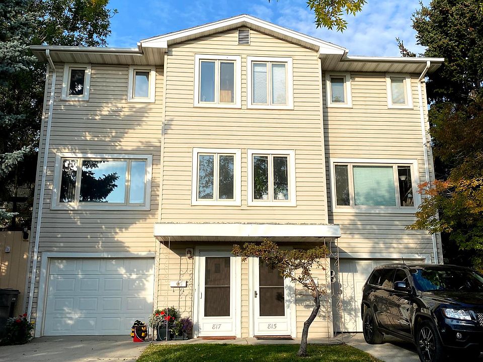 Classic 3 story duplex with garage.