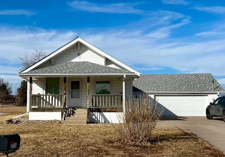 Covered front porch & 2-car attached garage