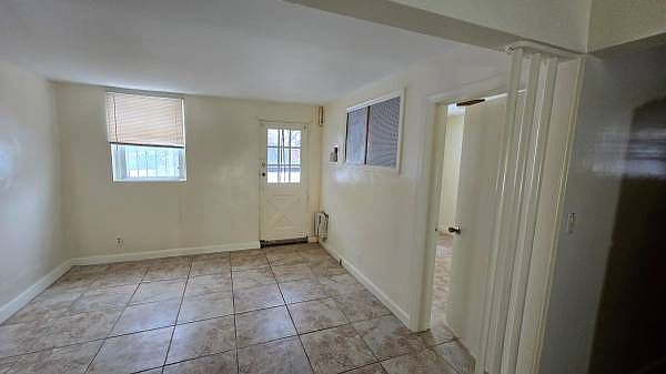 living room with rear door closed