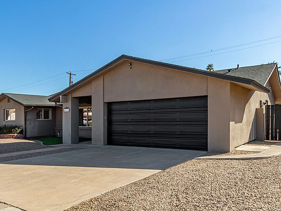 2 car garage w/new quiet garage door opener and freshly painted garage door.