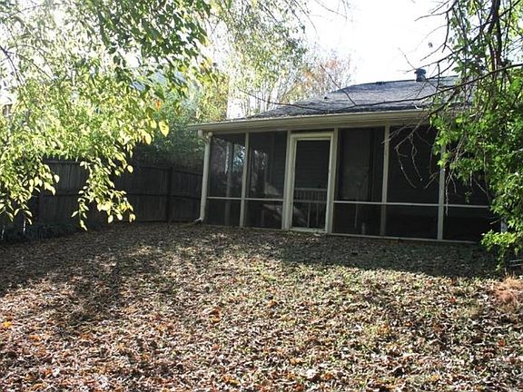Screened porch From the fenced backyard