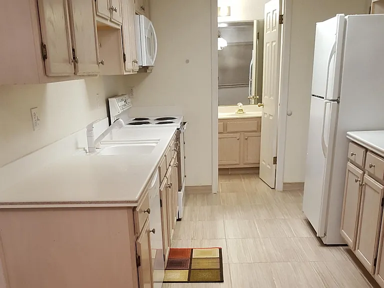 Kitchen and downstairs half bathroom