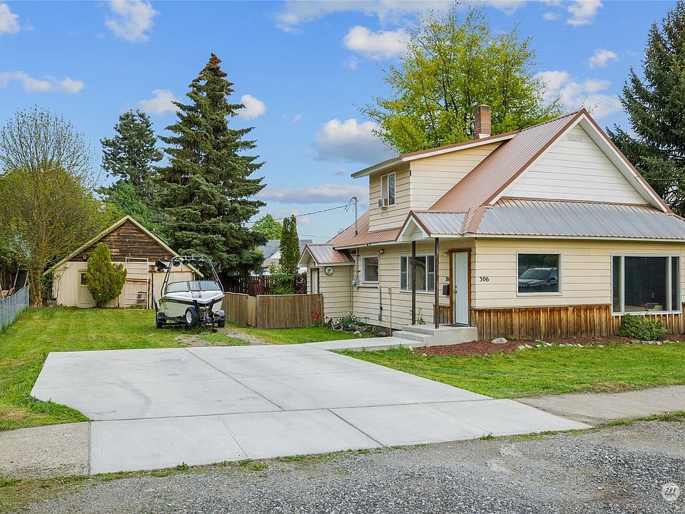 Great older garage for shop or storage, concrete parking pad for easy snow removal, & this oversized city lot provides extra off street parking for boat or RV!>