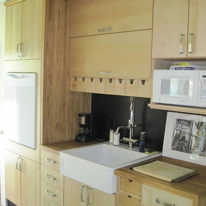 Deep farm kitchen sink, ergonomically placed dishwasher (no lower back pain required to load dishes). Just past the D/W is a new stackable washer & dryer.