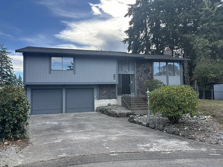 Large driveway including a two car garage and plenty of parking!