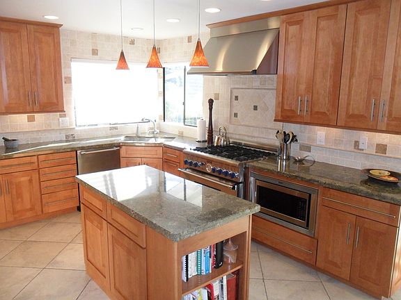 Large kitchen with Thermador appliances, Maple cabinets & Granite counters!