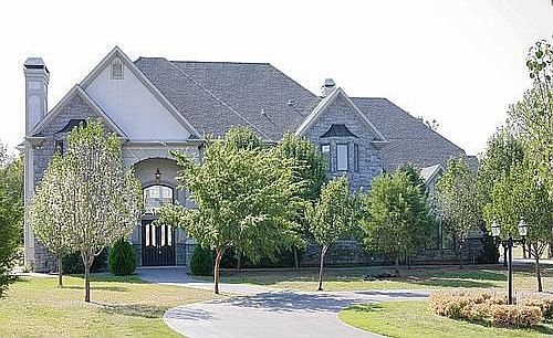Front view with elegant stone and stucco