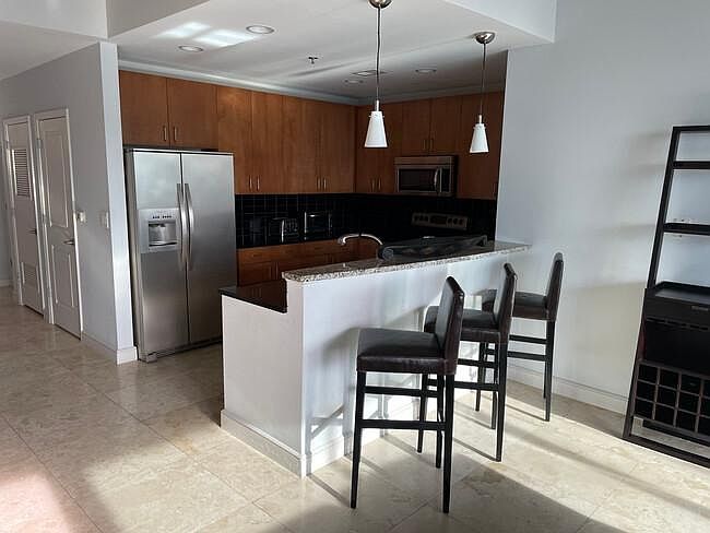 2nd image of 950 W Peachtree St #1801