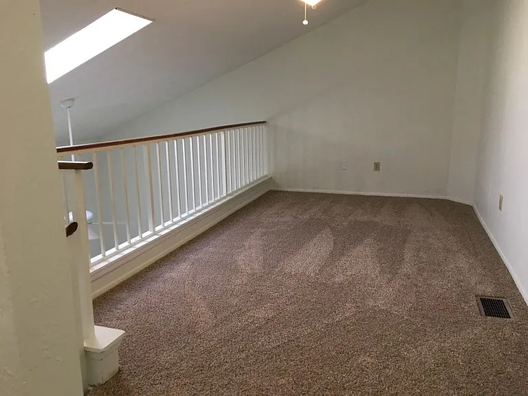 The spacious loft overlooks the living room