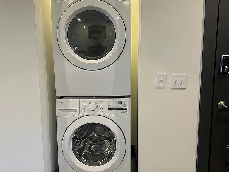 Nice stacked laundry in unit.